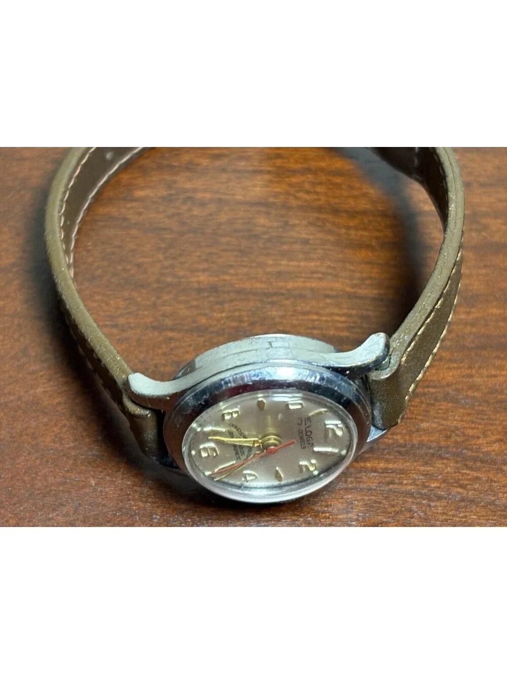 Vintage Eloga 17J Hand-Wind Watch Red Second Hand Cream Dial Explorer Font Swiss